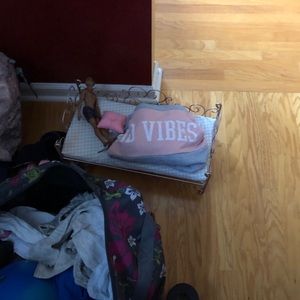 Bundle of toys and clothes and comforter